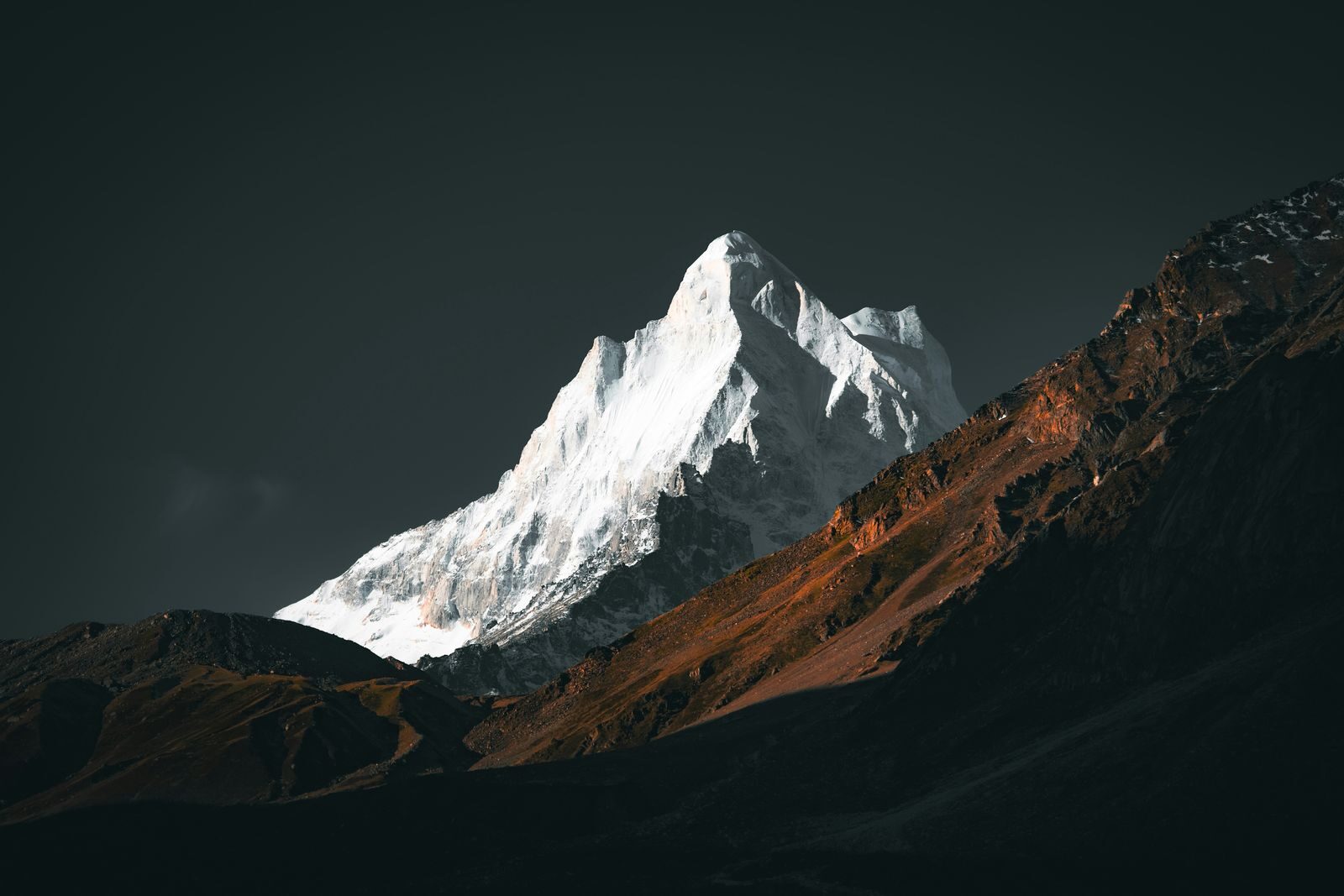 A snow-capped Himalayan peak at dawn