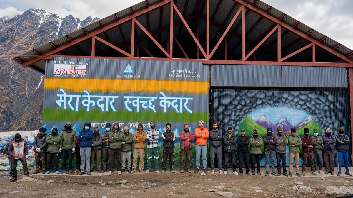 Women segregating waste at a mountain Material Recovery Facility